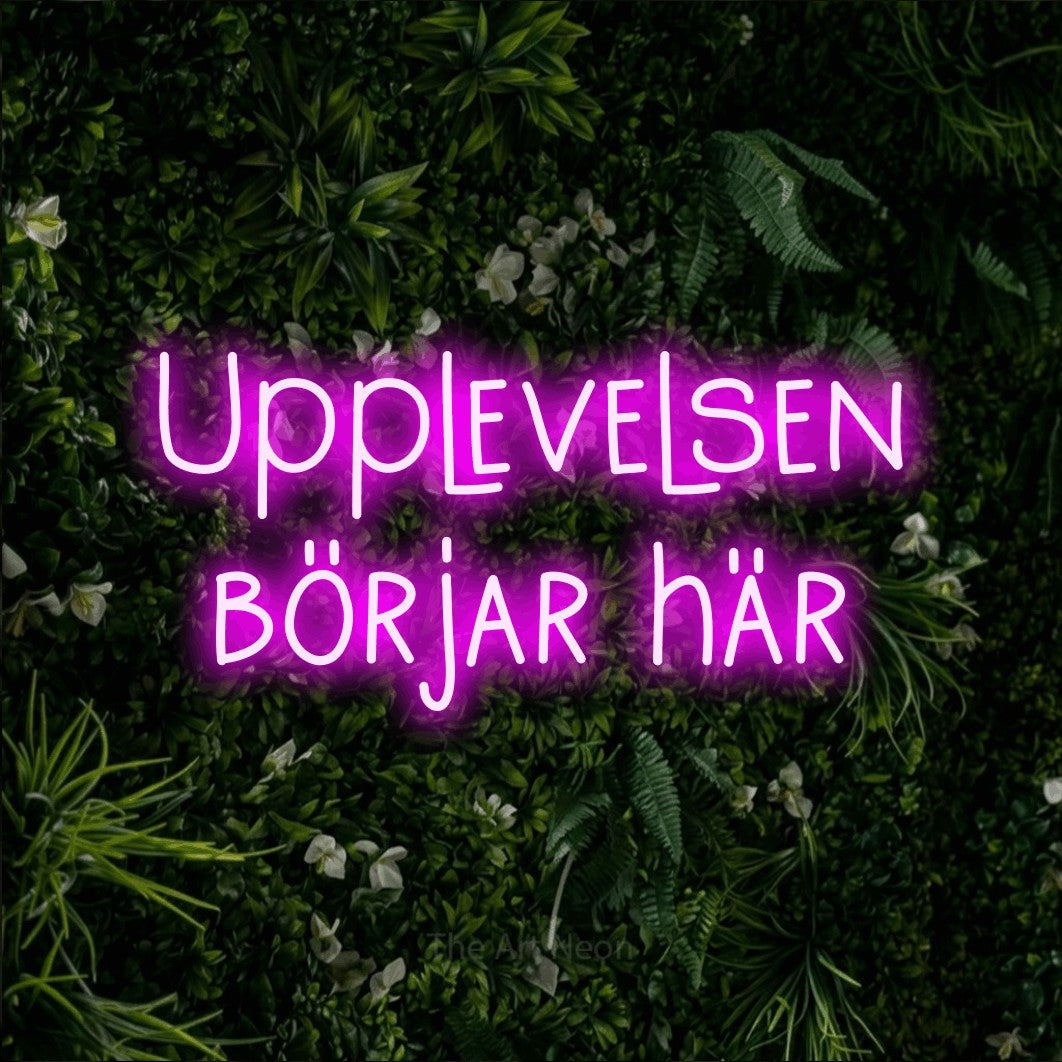 LED neon sign reading “Upplevelsen börjar här”, arranged in 2 lines.