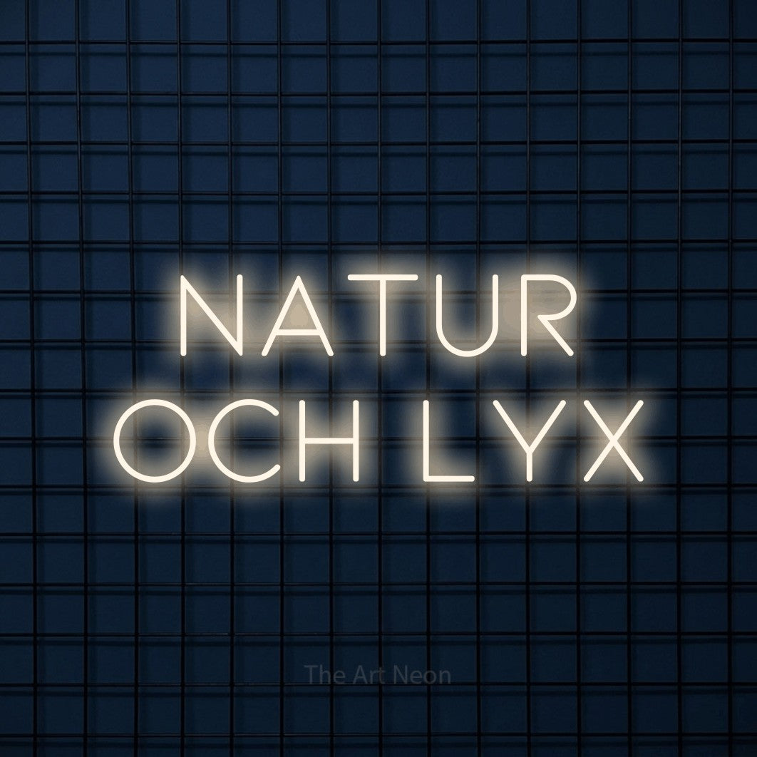LED neon sign reading “natur och lyx”, arranged in 2 lines.