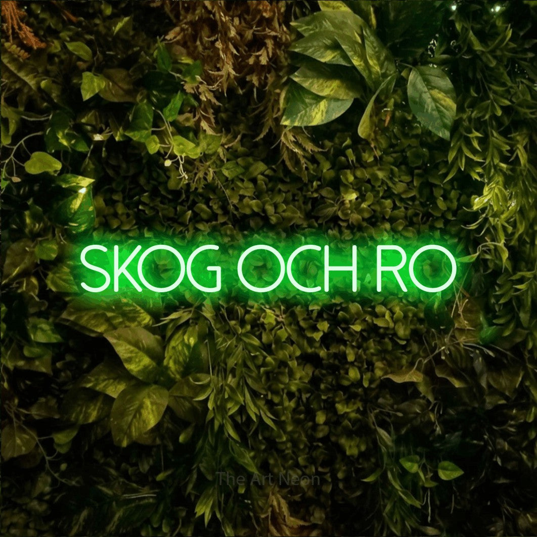 LED neon sign reading “SKOG OCH RO”, arranged in a single line.