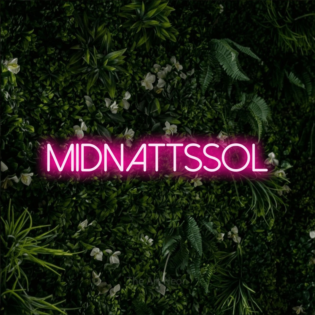 LED neon sign reading “MIDNATTSSOL”, arranged in a single line.