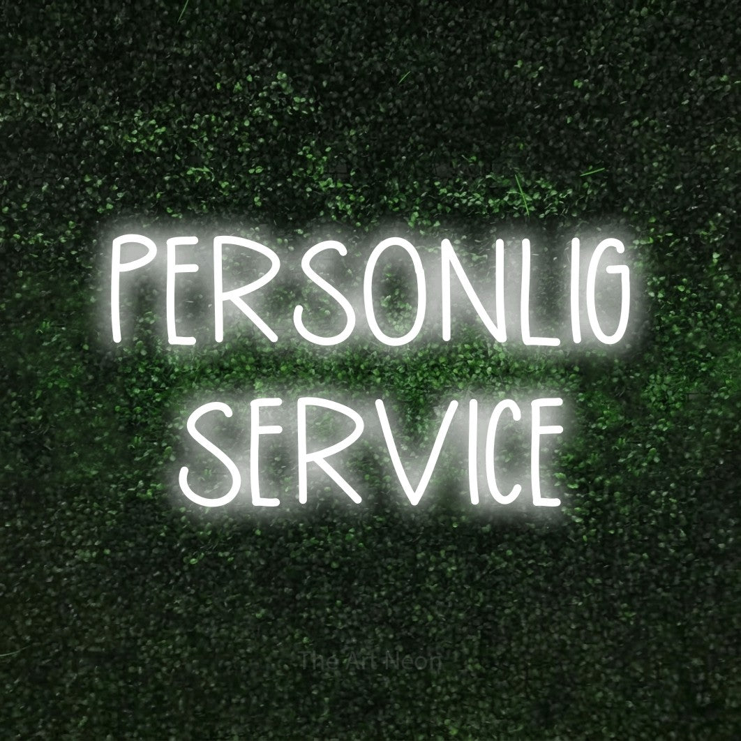 LED neon sign reading “PERSONLIG SERVICE”, arranged in 2 lines.