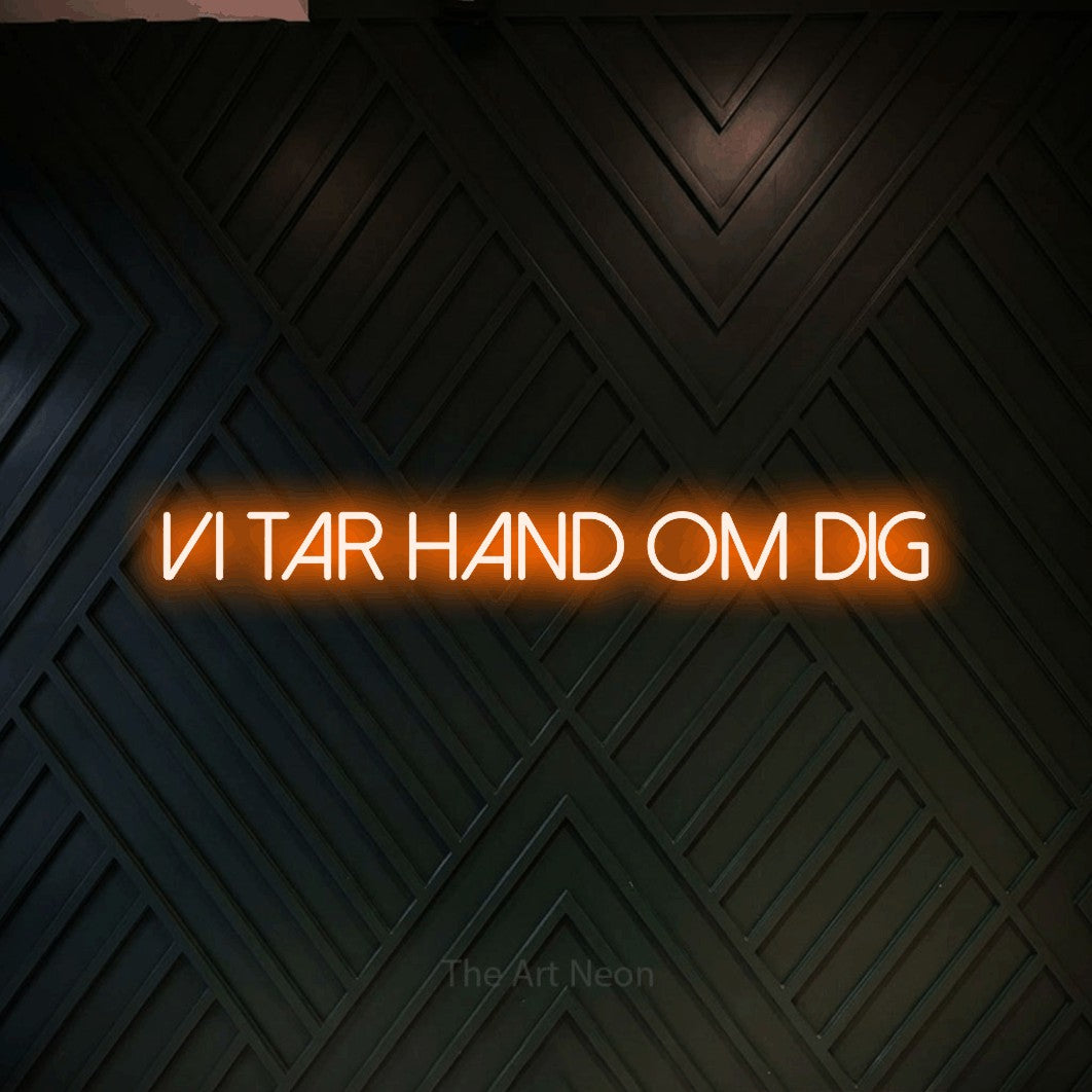 LED neon sign reading “vi tar hand om dig”, arranged in a single line.