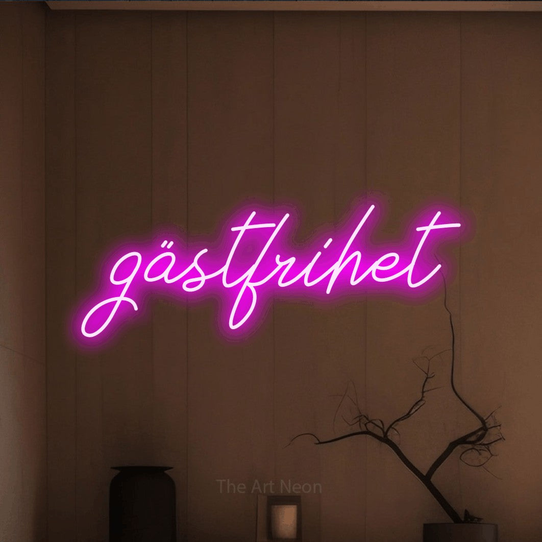 LED neon sign reading “gästfrihet”, arranged in a single line.