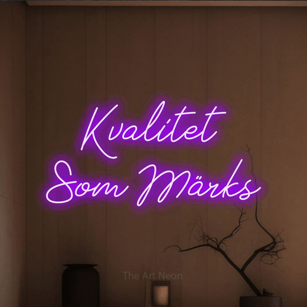 LED neon sign reading “Kvalitet Som Märks”, arranged in 2 lines.
