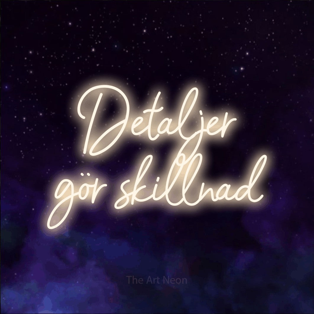 LED neon sign reading “Detaljer gör skillnad”, arranged in 2 lines.