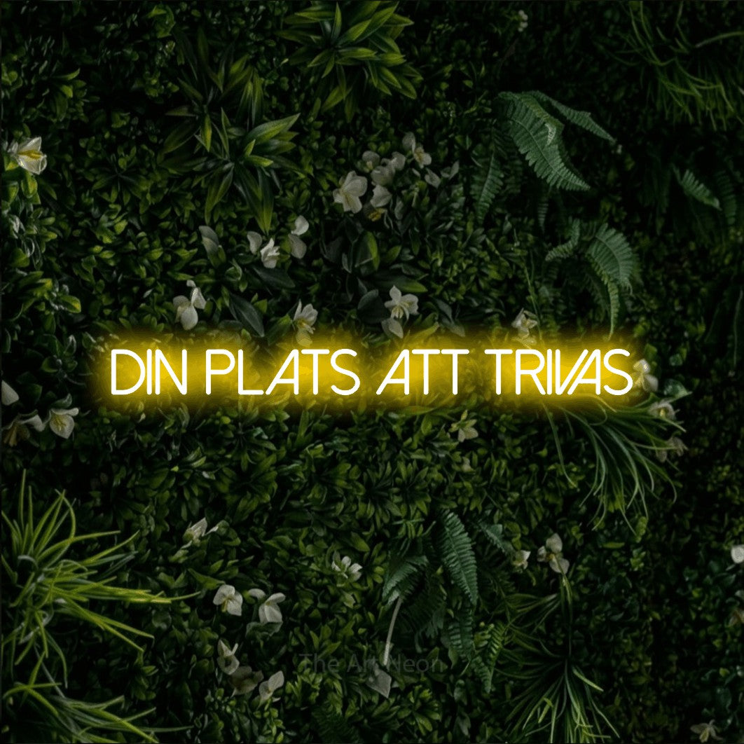LED neon sign reading “din plats att trivas”, arranged in a single line.