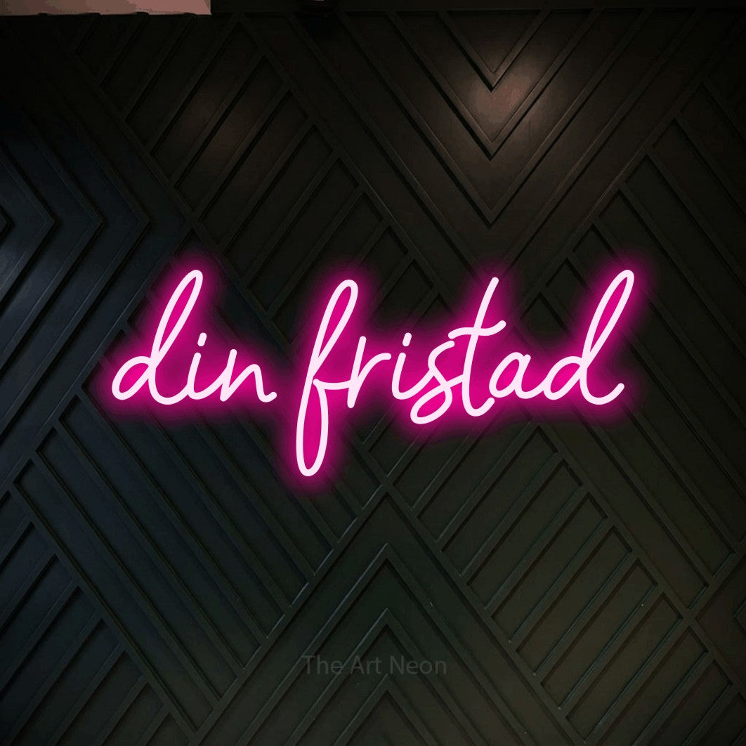LED neon sign reading “din fristad”, arranged in a single line.