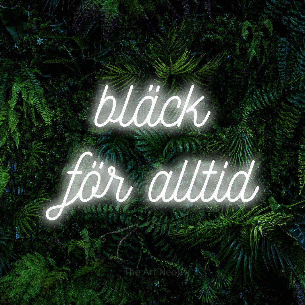 LED neon sign reading “bläck för alltid”, arranged in 2 lines.