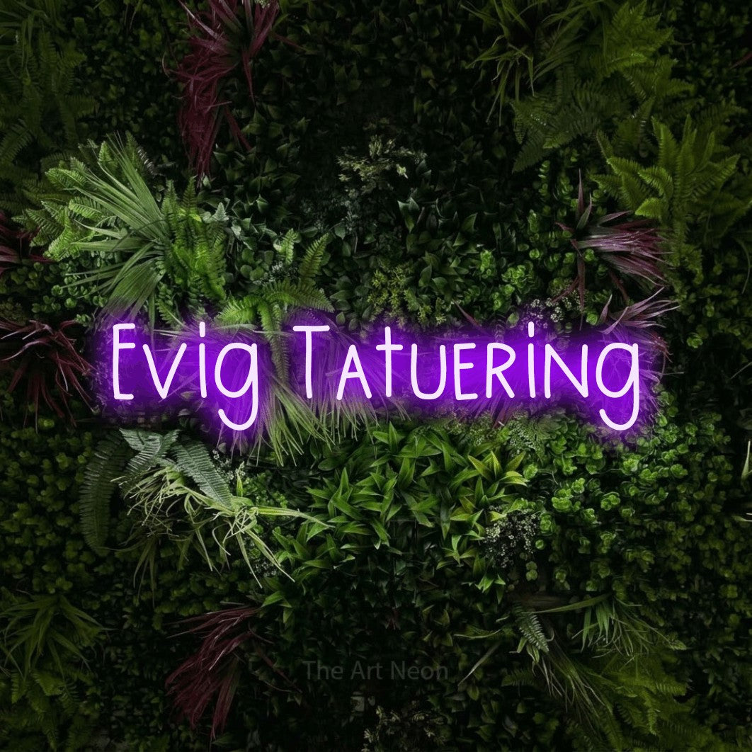 LED neon sign reading “Evig Tatuering”, arranged in a single line.