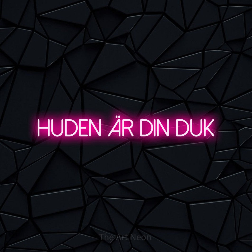 LED neon sign reading “huden är din duk”, arranged in a single line.
