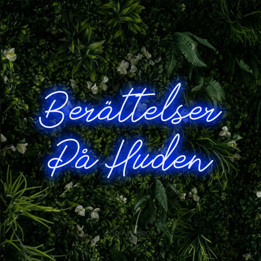 LED neon sign reading “Berättelser På Huden”, arranged in 2 lines.