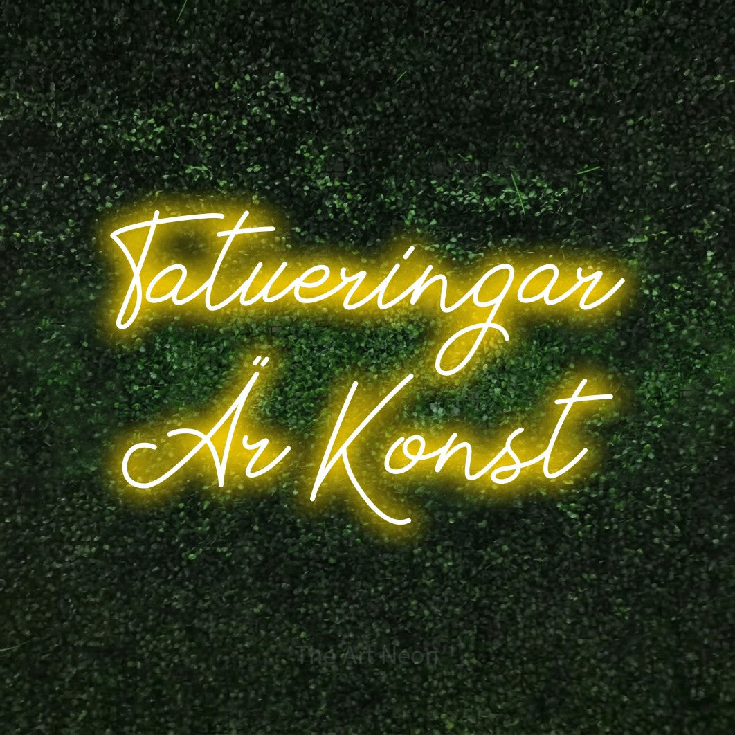 LED neon sign reading “Tatueringar Är Konst”, arranged in 2 lines.