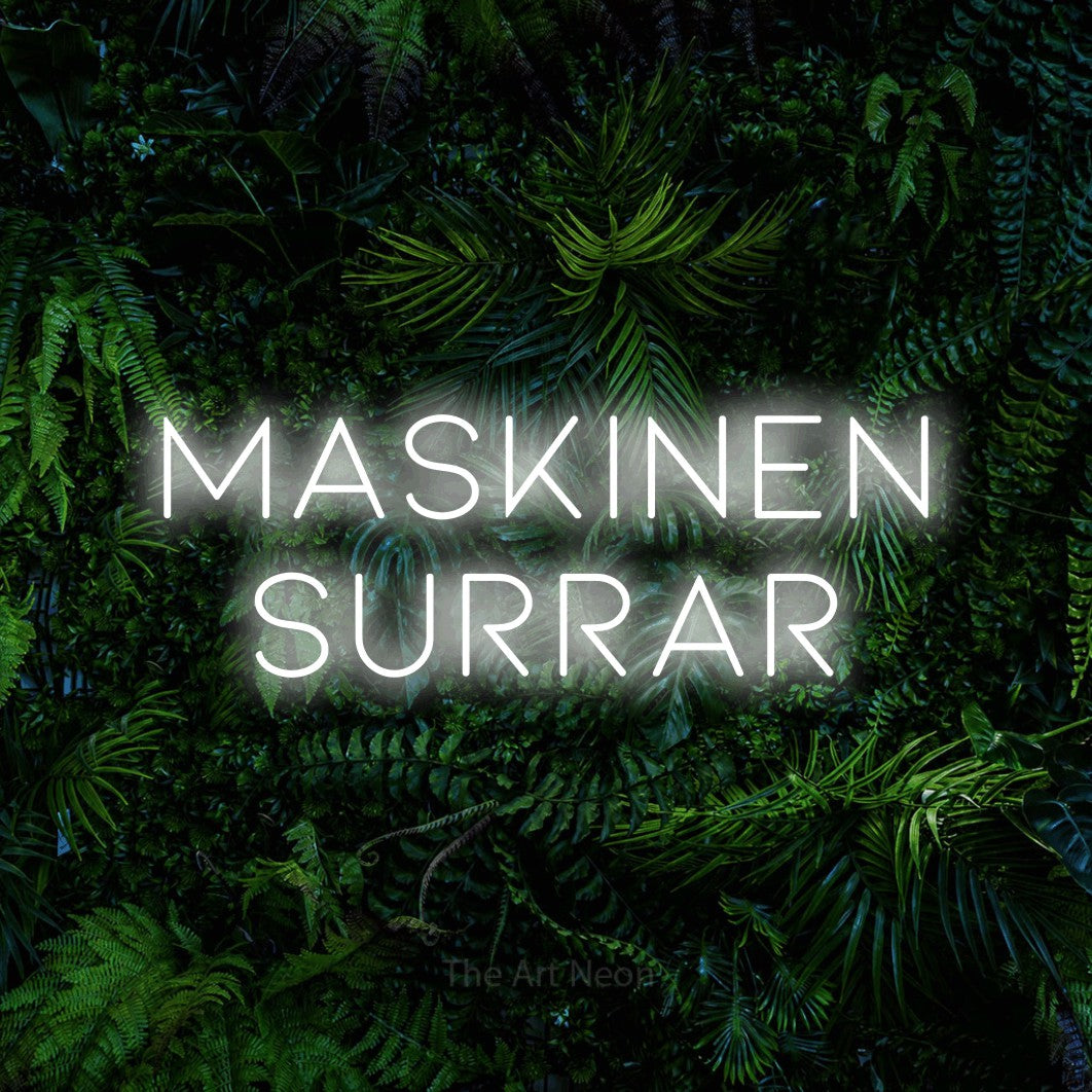 LED neon sign reading “Maskinen Surrar”, arranged in 2 lines.