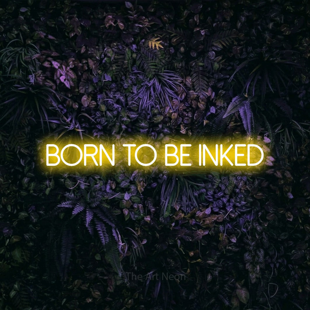 LED neon sign reading “born to be INKED”, arranged in a single line.