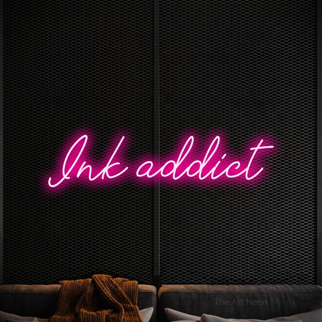 LED neon sign reading “Ink addict”, arranged in a single line.
