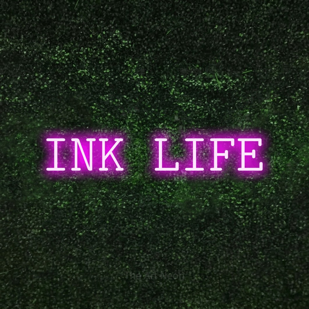 LED neon sign reading “INK LIFE”, arranged in a single line.