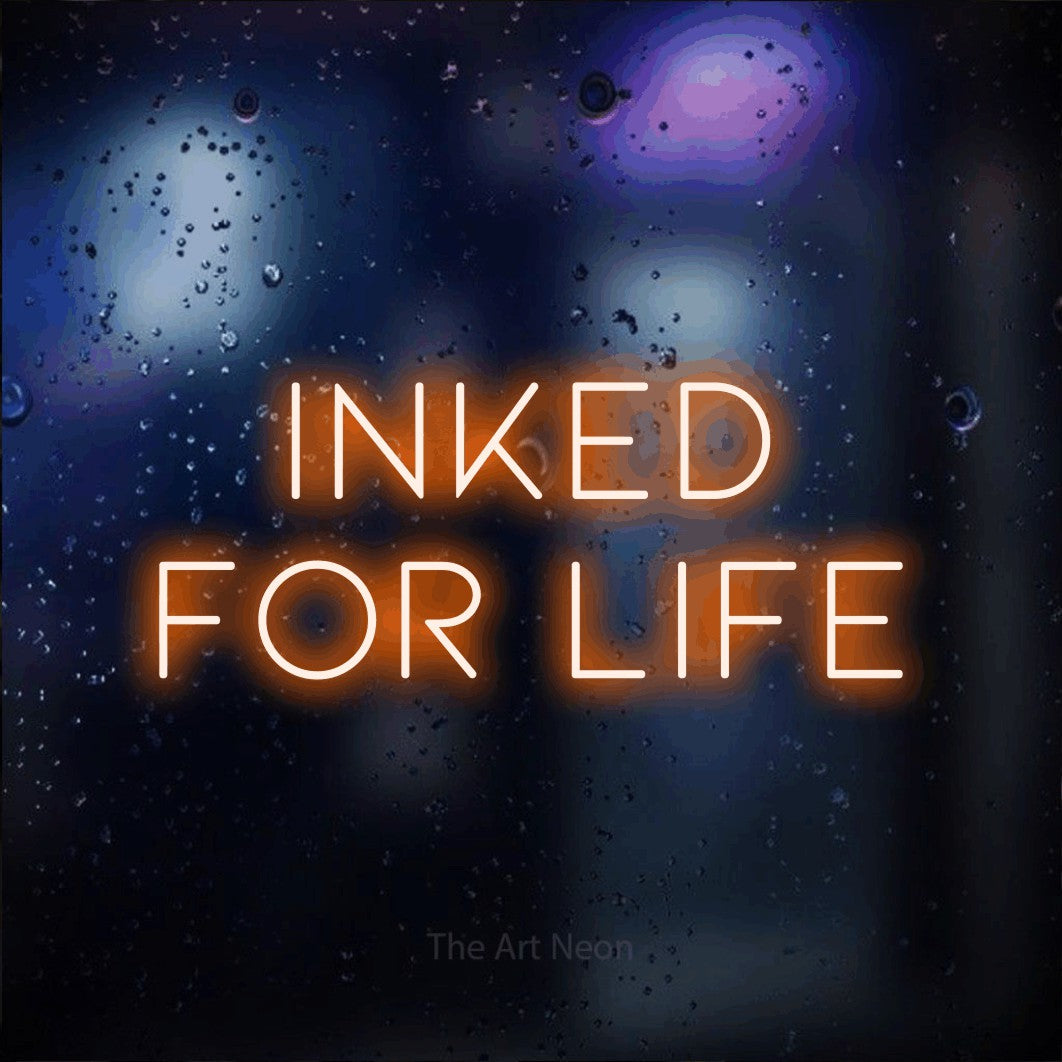 LED neon sign reading “INKED FOR LIFE”, arranged in 2 lines.