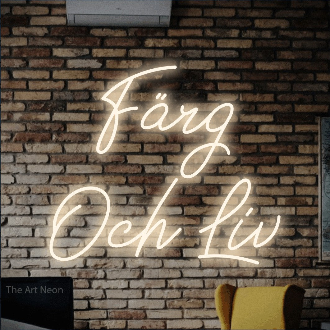 LED neon sign reading “Färg Och Liv”, arranged in 2 lines.