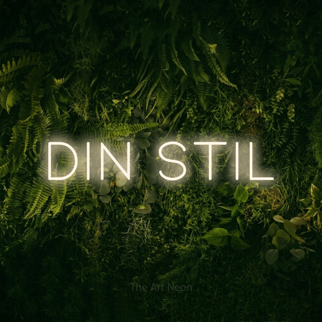 LED neon sign reading “Din Stil”, arranged in a single line.