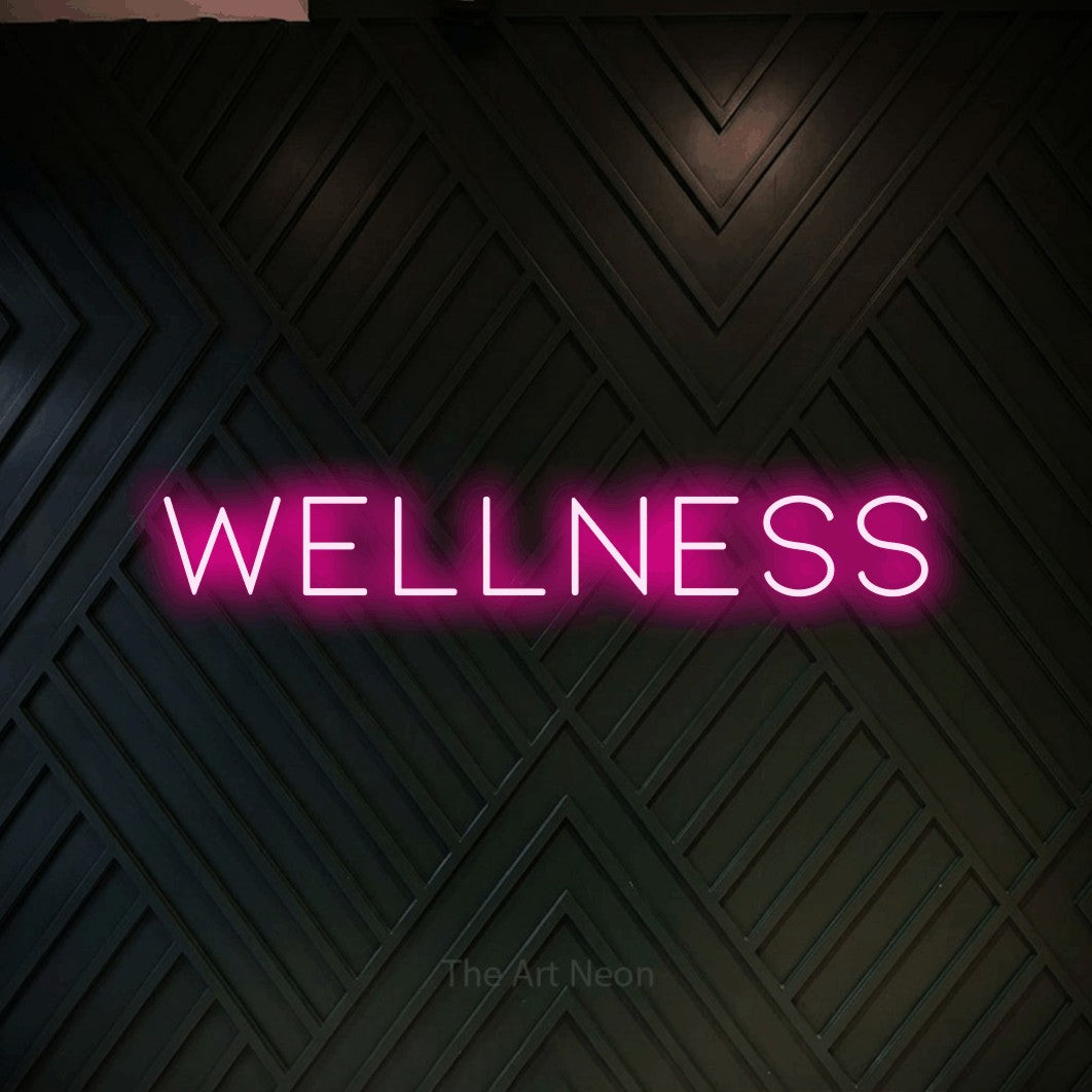 LED neon sign reading “WELLNESS”, arranged in a single line.