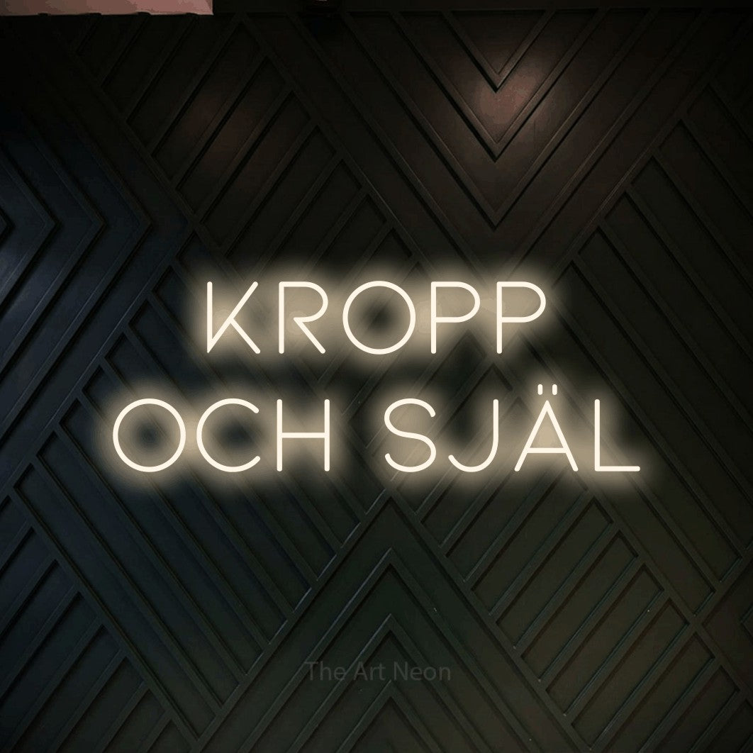 LED neon sign reading “KROPP och själ”, arranged in 2 lines.