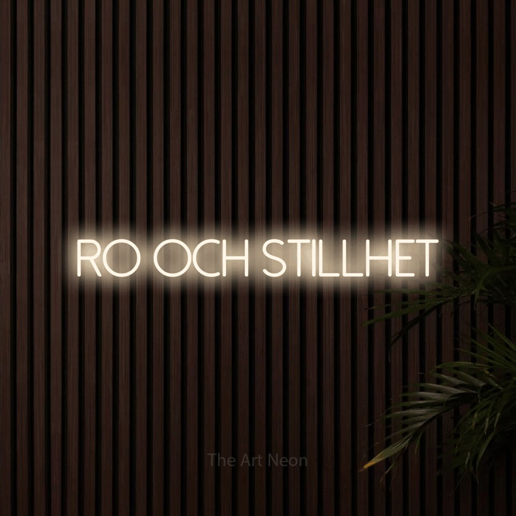 LED neon sign reading “Ro och stillhet”, arranged in a single line.