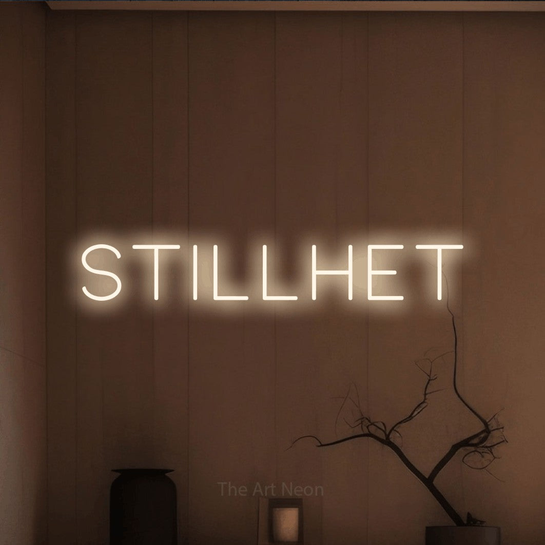 LED neon sign reading “STILLHET”, arranged in a single line.