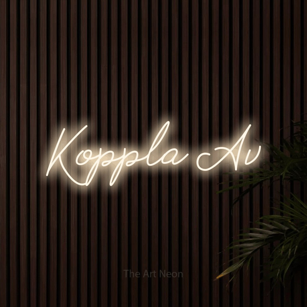 LED neon sign reading “Koppla Av”, arranged in a single line.