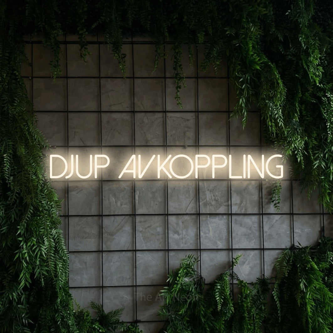 LED neon sign reading “DJUP AVKOPPLING”, arranged in a single line.