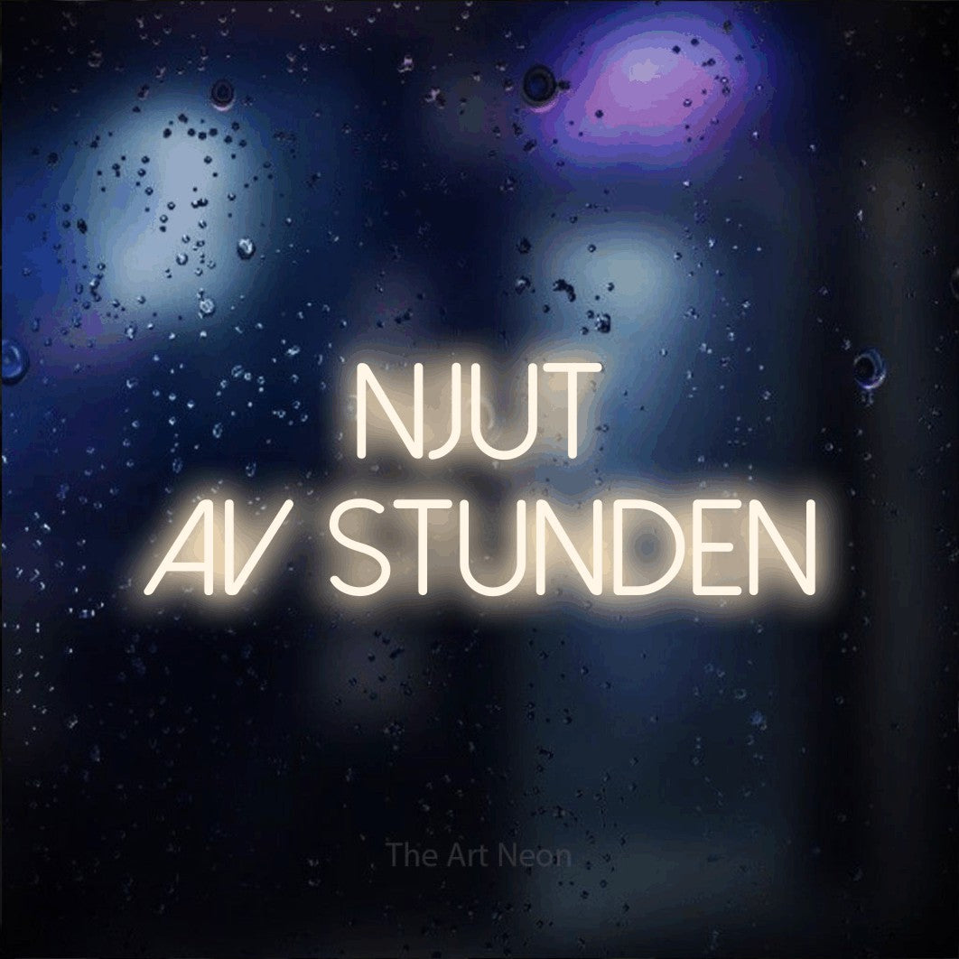 LED neon sign reading “Njut Av Stunden”, arranged in 2 lines.