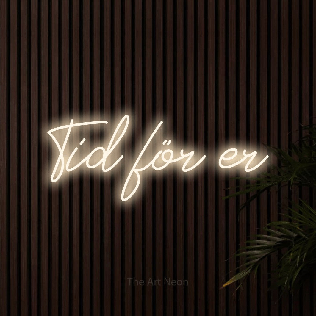 LED neon sign reading “Tid för er”, arranged in a single line.
