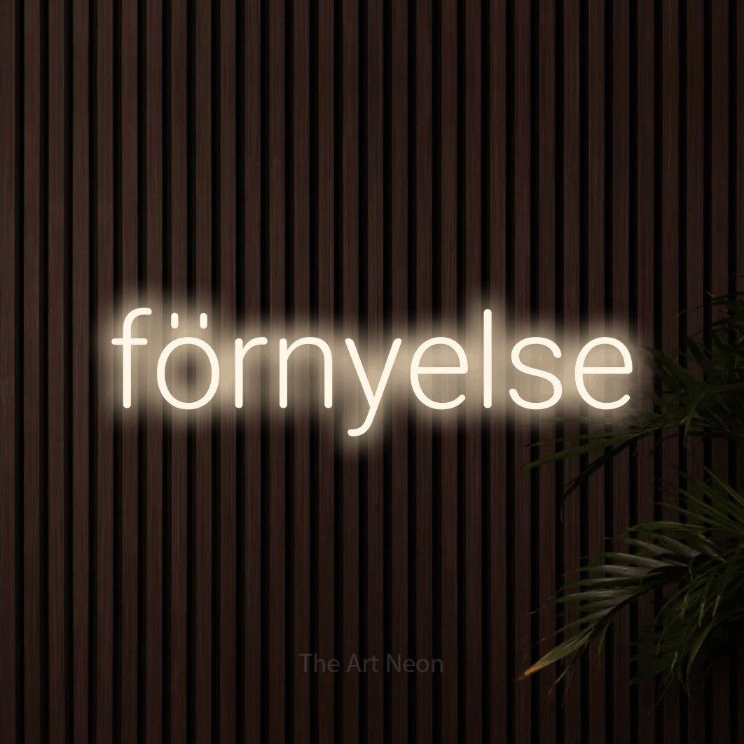 LED neon sign reading “förnyelse”, arranged in a single line.
