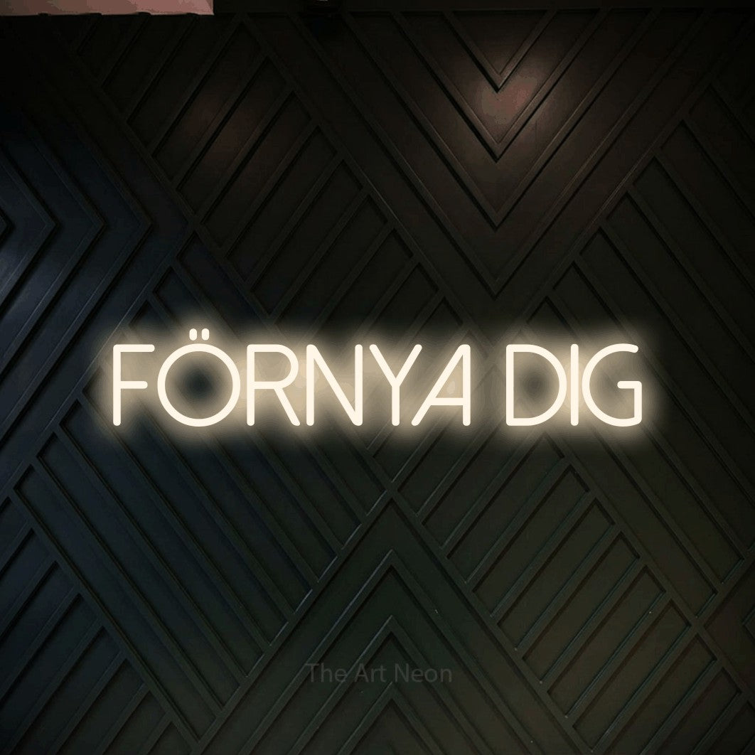 LED neon sign reading “förnya dig”, arranged in a single line.
