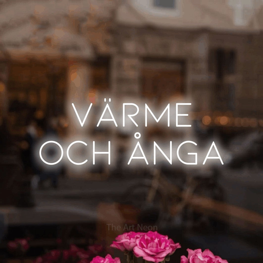 LED neon sign reading “värme och ånga”, arranged in 2 lines.