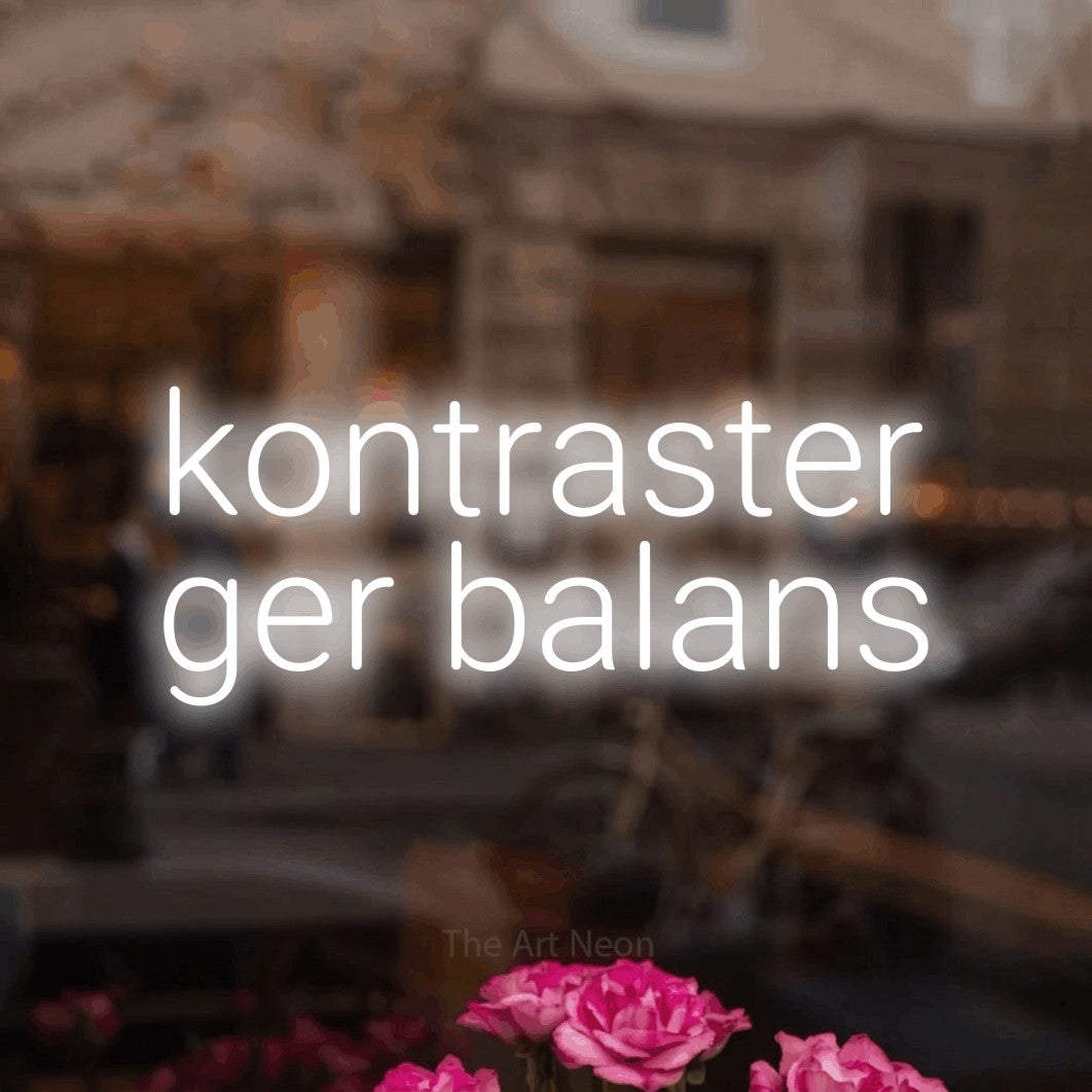 LED neon sign reading “kontraster ger balans”, arranged in 2 lines.