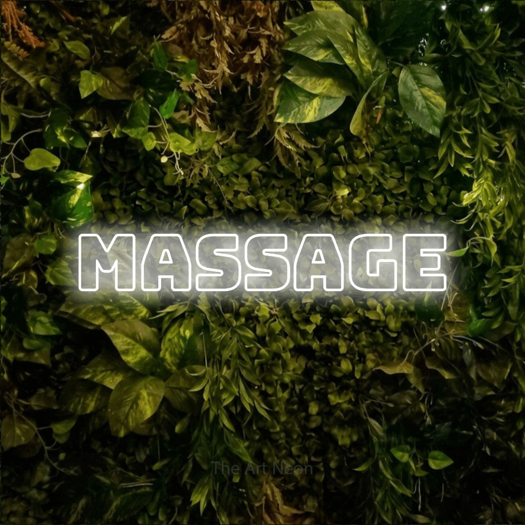 LED neon sign reading “massage”, arranged in a single line.