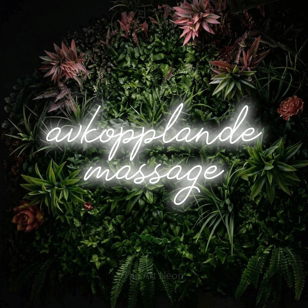 LED neon sign reading “avkopplande massage”, arranged in 2 lines.