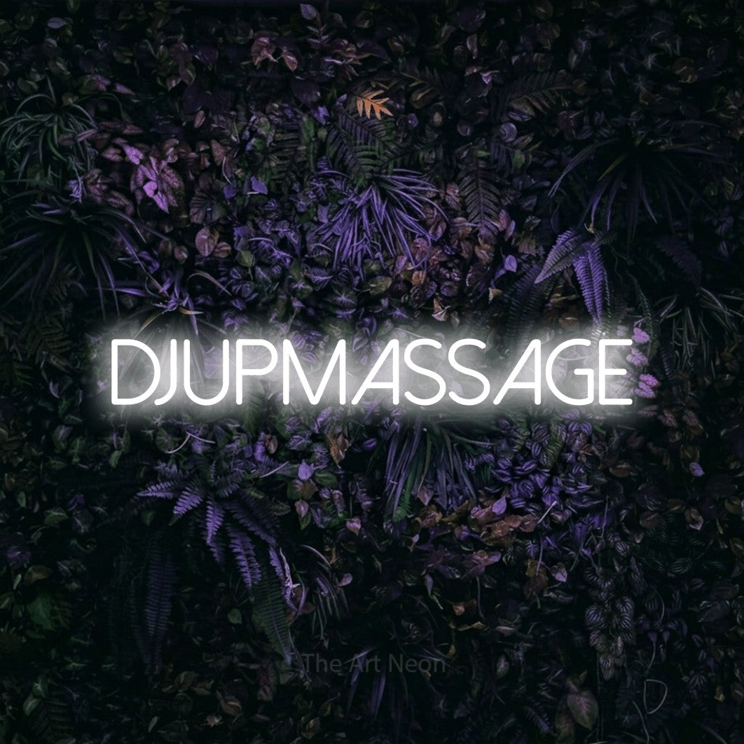 LED neon sign reading “DJUPMASSAGE”, arranged in a single line.
