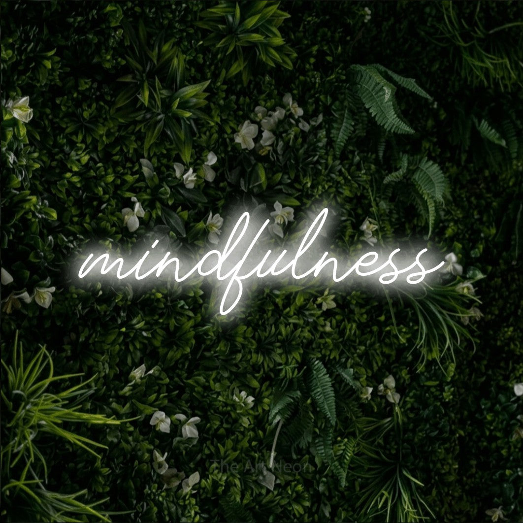LED neon sign reading “mindfulness”, arranged in a single line.
