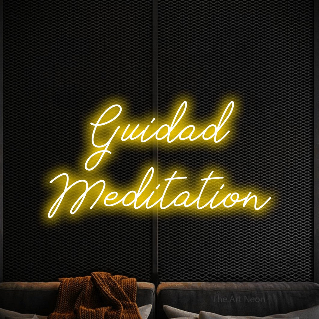 LED neon sign reading “Guidad Meditation”, arranged in 2 lines.