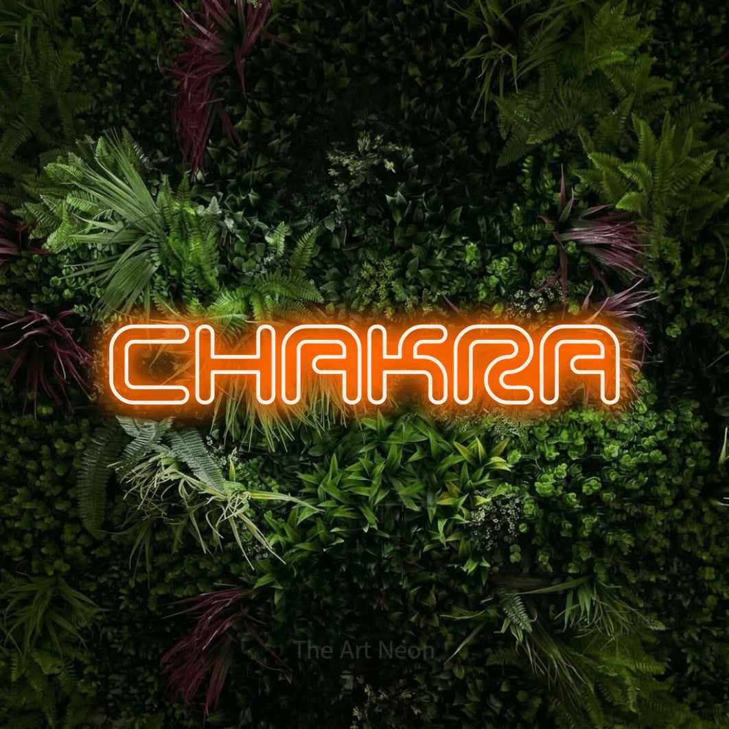 LED neon sign reading “CHAKRA”, arranged in a single line.