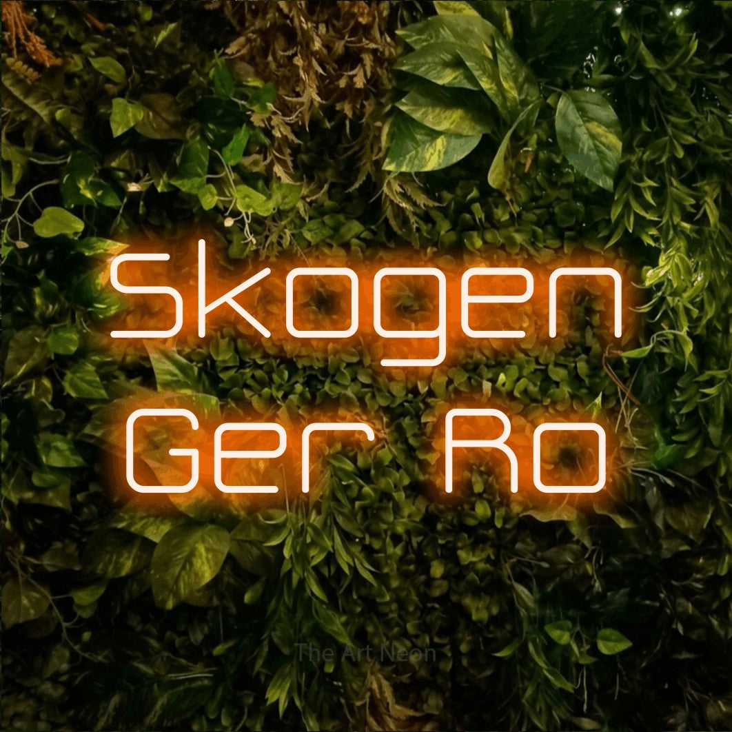 LED neon sign reading “Skogen Ger Ro”, arranged in 2 lines.