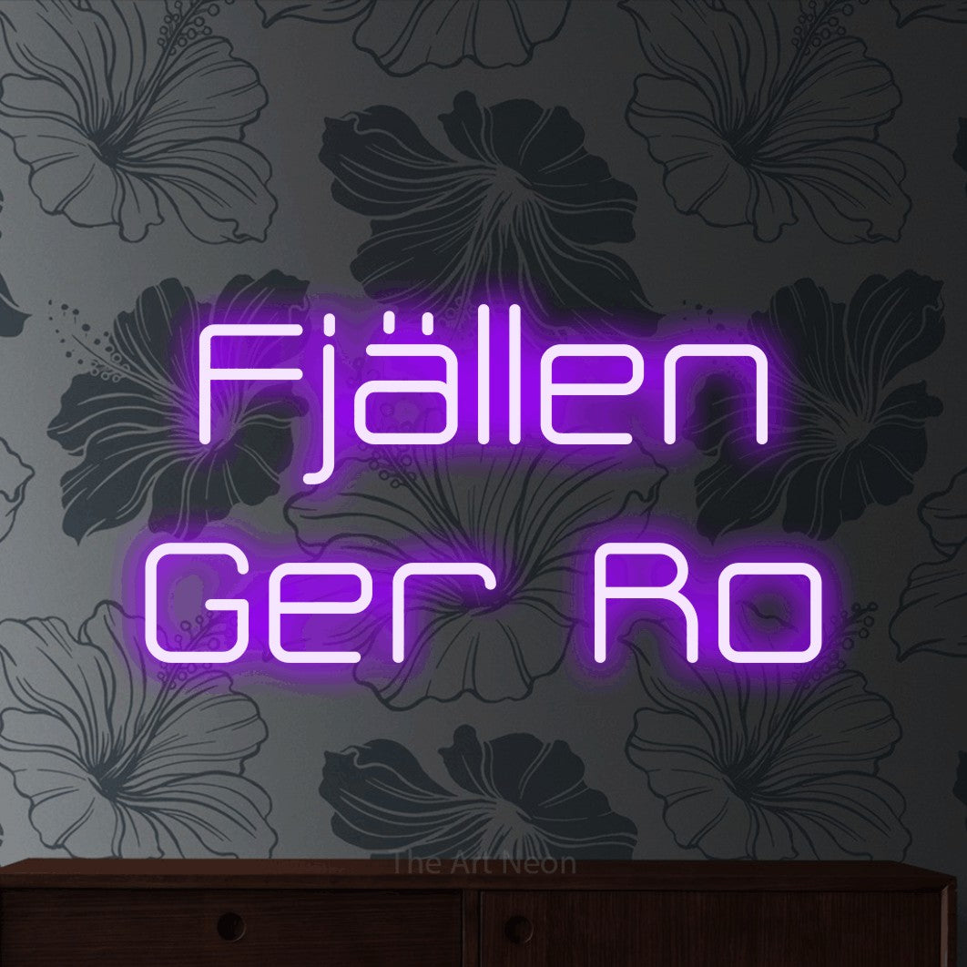 LED neon sign reading “Fjällen Ger Ro”, arranged in 2 lines.