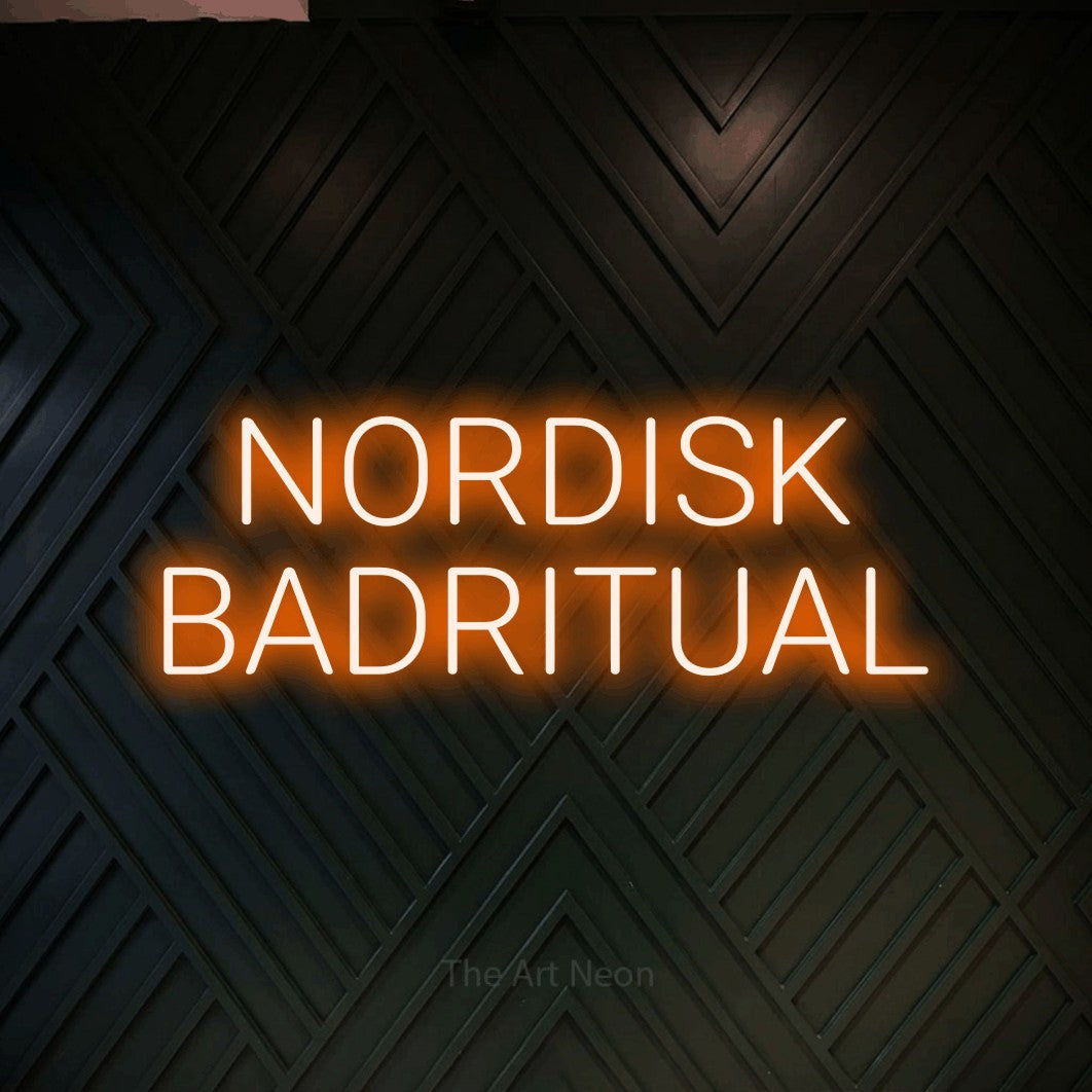 LED neon sign reading “NORDISK BADRITUAL”, arranged in 2 lines.