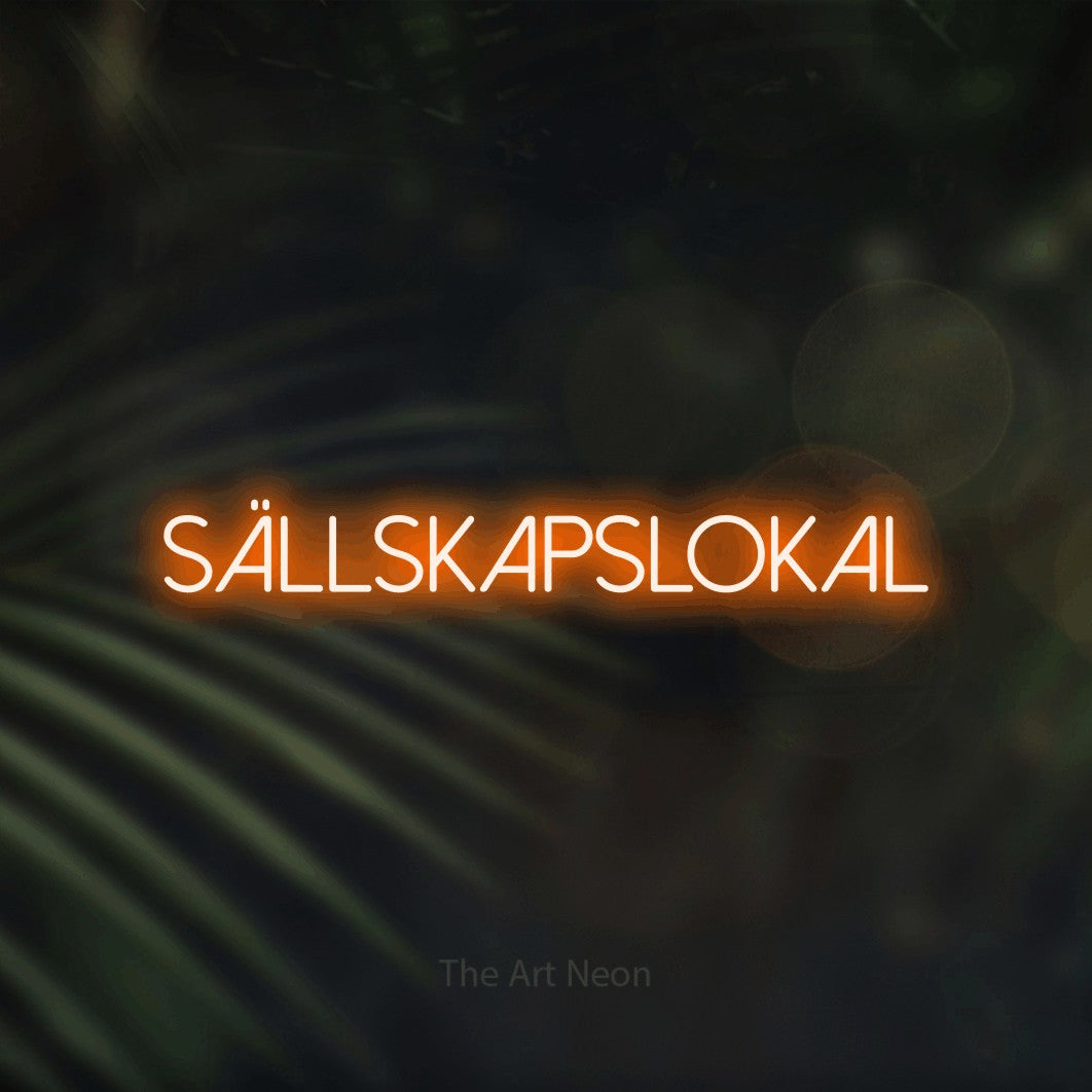LED neon sign reading “Sällskapslokal”, arranged in a single line.
