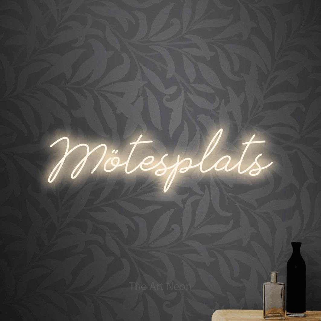 LED neon sign reading “Mötesplats”, arranged in a single line.