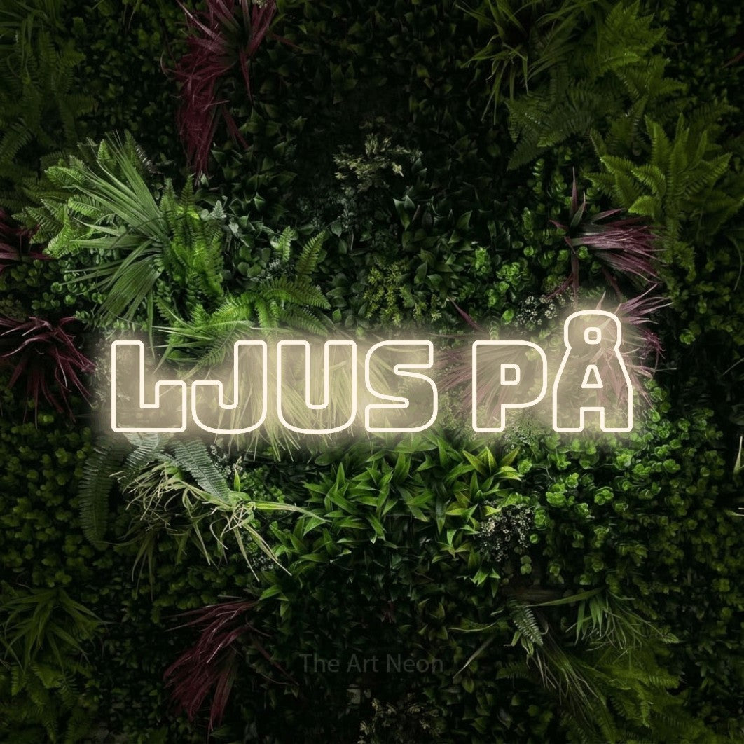 LED neon sign reading “Ljus På”, arranged in a single line.