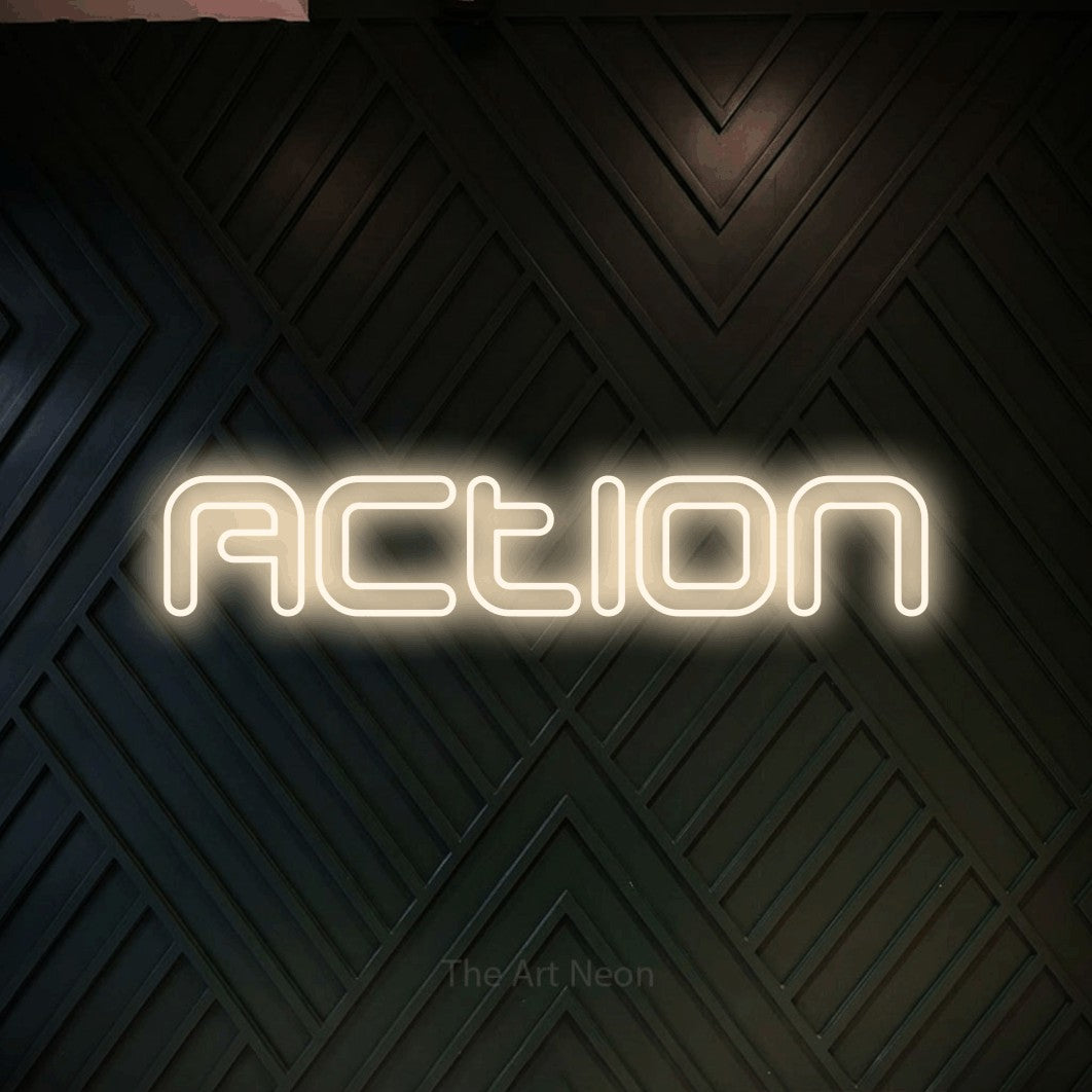 LED neon sign reading “Action”, arranged in a single line.