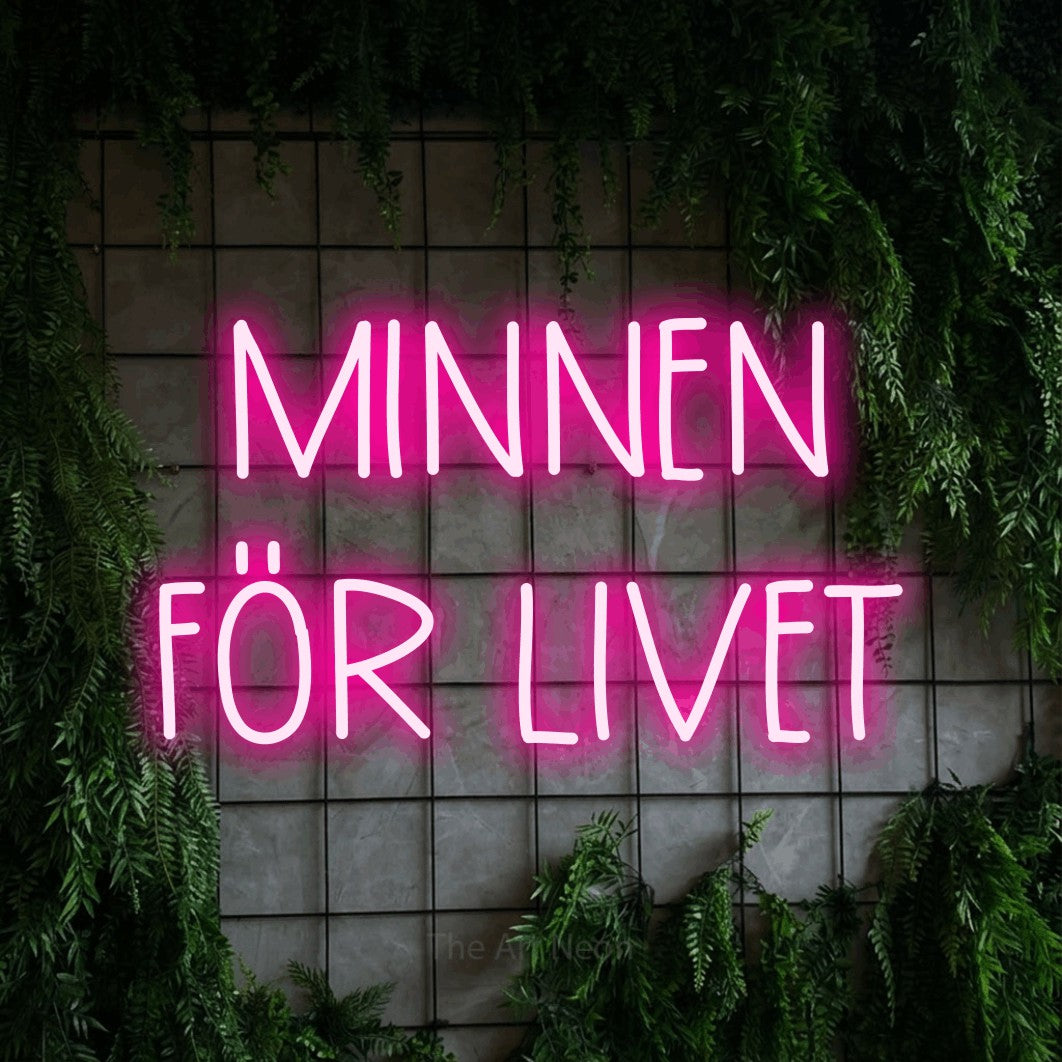 LED neon sign reading “MINNEN FÖR LIVET”, arranged in 2 lines.