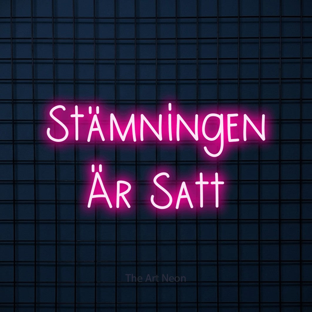 LED neon sign reading “Stämningen Är Satt”, arranged in 2 lines.
